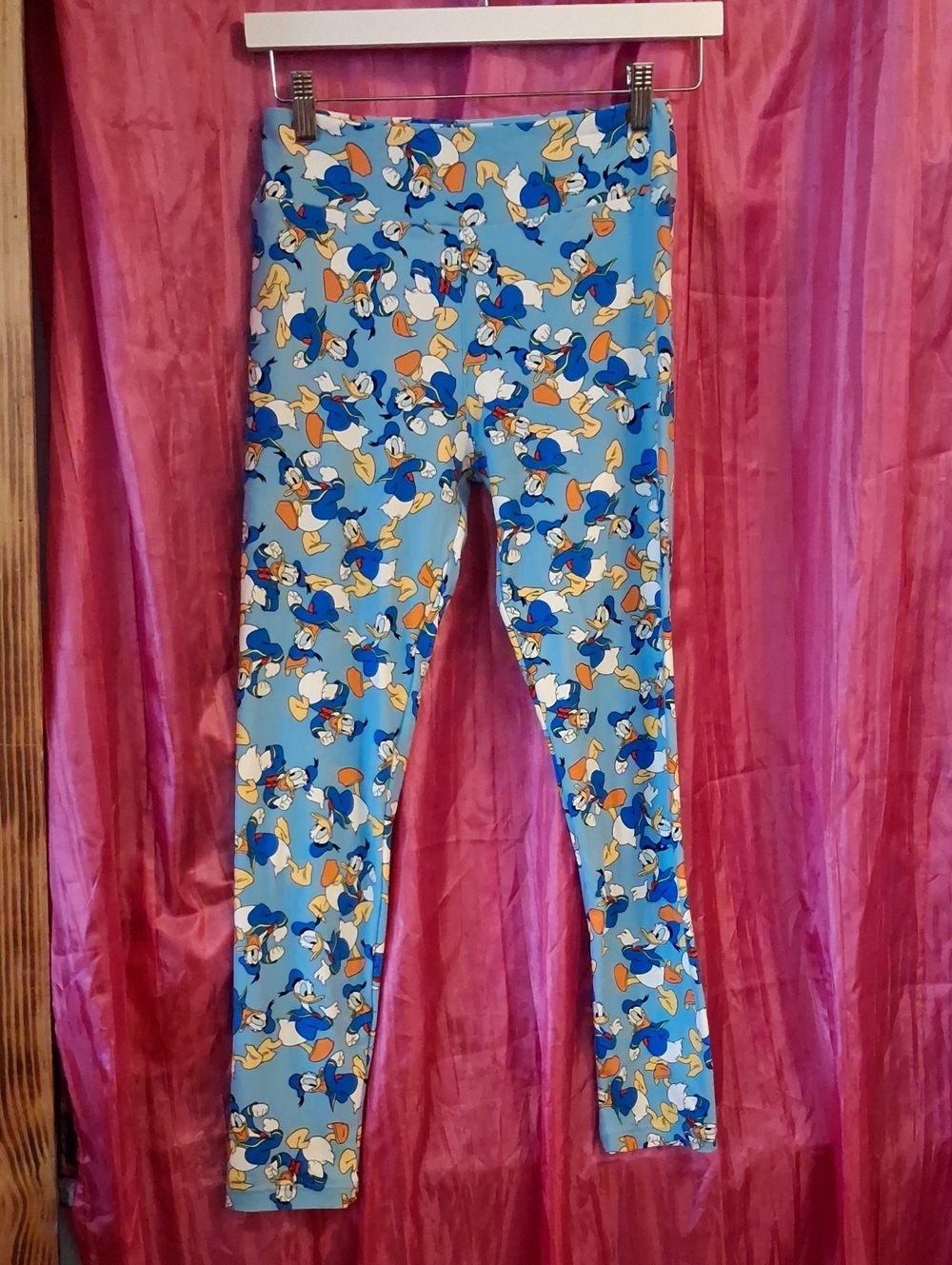 LuLaRoe Light Blue Donald Duck Leggings with Yellow & Orange Accents